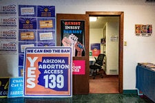 Signs at the Tucson, Ariz., headquarters of Arizona List, a group that supports female Democratic abortion rights advocates who are running for office. 