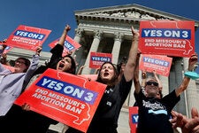 Abortion rights supporters celebrate in September after the Missouri Supreme Court ruled that the amendment to protect abortion rights would stay on the November ballot.