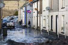 A mud-covered street after flooding from Storm Bert in Cwmtillery, Wales, on Monday.
