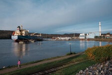 An oil and chemical tanker offloading its cargo next to an idle natural gas power plant in Bucksport, Maine.