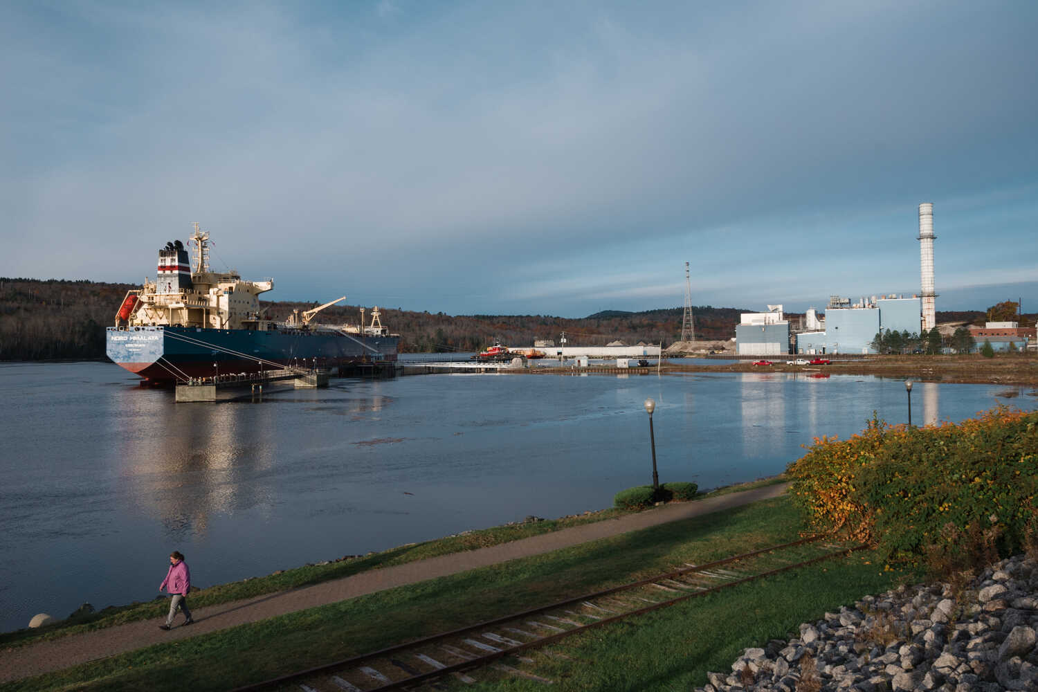 An oil and chemical tanker offloading its cargo next to an idle natural gas power plant in Bucksport, Maine.