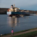 An oil and chemical tanker offloading its cargo next to an idle natural gas power plant in Bucksport, Maine.