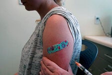 In Provo, Utah, a young adult received a measles, mumps and rubella vaccine made by Merck. About a fifth of the drug manufacturer’s revenue comes from two types of vaccines that Robert F. Kennedy Jr. has targeted.